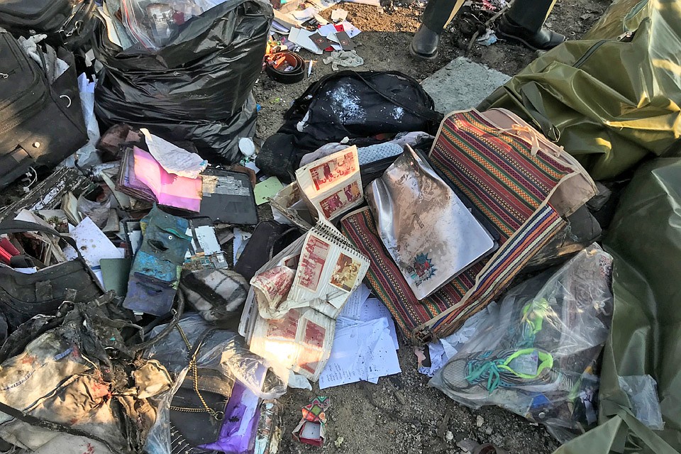 Семейный альбом пассажира разбившегося "Боинга" Фото: REUTERS